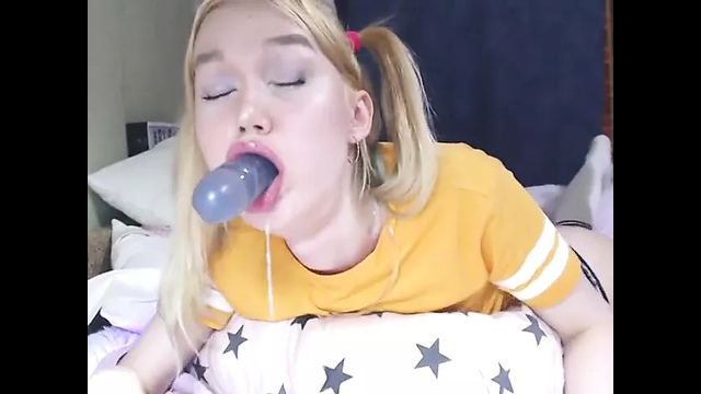Pigtailed Blonde Chokes, Drools And Gags On A Big Dildo