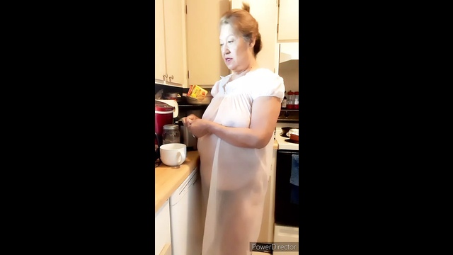 Mature woman in transparent granny night gown, natural tits